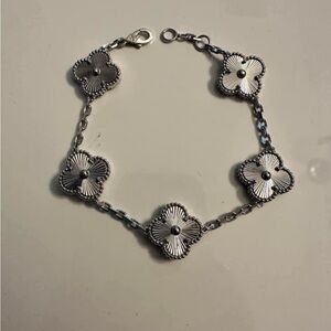 White gold plated clover bracelet. New.
